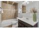 Well-lit bathroom with combined shower and bathtub at 1185 Worchester St, Aurora, CO 80011