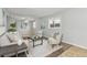 Cozy living room with comfortable seating, natural lighting, and hardwood floors at 1185 Worchester St, Aurora, CO 80011