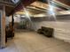 Unfinished basement space with exposed ceilings, ready for customization and storage options at 15600 Bolling, Denver, CO 80239