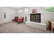 Inviting living area featuring a fireplace, creating a warm and relaxing space for gathering at 6031 S Pennsylvania St, Centennial, CO 80121