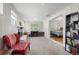 Cozy living room with bright, natural light and a seamless transition into the bedroom for easy living at 6031 S Pennsylvania St, Centennial, CO 80121