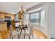 Charming dining nook with bay window and chandelier, perfect for meals at 22030 Hill Gail Way, Parker, CO 80138