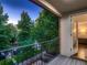 Balcony overlooking a tree-lined street, offering a private outdoor space at 338 Saint Paul St, Denver, CO 80206