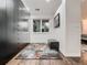 Walk-in closet with built-in storage, natural light, and hardwood flooring, offering functionality and style at 338 Saint Paul St, Denver, CO 80206