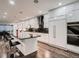 Contemporary kitchen featuring sleek white cabinets, granite countertops, and stainless steel appliances at 338 Saint Paul St, Denver, CO 80206