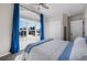 Bedroom with a large window, closet, and en-suite bath at 3603 Soaring Eagle Ct, Castle Rock, CO 80109