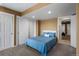 Bedroom with open doorway, closet, and ample space for relaxing at 3603 Soaring Eagle Ct, Castle Rock, CO 80109