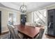 Spacious dining room with modern lighting and ample seating at 3603 Soaring Eagle Ct, Castle Rock, CO 80109