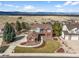 Beautiful two-story home with brick accents and a well-manicured lawn and beautiful mountain view at 3603 Soaring Eagle Ct, Castle Rock, CO 80109
