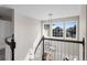 Foyer of a home with stairs and light coming through the front door at 3603 Soaring Eagle Ct, Castle Rock, CO 80109