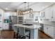 Modern kitchen featuring stainless steel appliances and a large island at 3603 Soaring Eagle Ct, Castle Rock, CO 80109