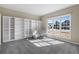 Bright office with large windows and built-in shelving providing ample storage at 3603 Soaring Eagle Ct, Castle Rock, CO 80109