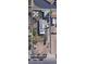 Aerial view of the property with a large backyard and garage, showcasing the property layout and neighborhood at 5660 Olive St, Commerce City, CO 80022