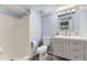 Bathroom featuring walk-in shower and modern vanity at 12616 Country Meadows Dr, Parker, CO 80134