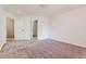 Bedroom featuring carpet flooring and multiple doorways at 12616 Country Meadows Dr, Parker, CO 80134