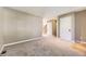 Neutral living room with plush carpet, a staircase view, and a spacious feel at 12616 Country Meadows Dr, Parker, CO 80134