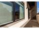 Exterior patio featuring a large window with horizontal blinds at 2876 W 53Rd Ave # 111, Denver, CO 80221