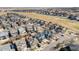 An aerial view of a vibrant neighborhood featuring well-maintained homes and picturesque streetscapes at 11712 Lewiston St, Commerce City, CO 80022