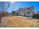 Beautiful backyard with a concrete patio, providing ample space for outdoor dining and lounging at 11712 Lewiston St, Commerce City, CO 80022