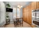 Charming kitchen with an adjacent breakfast nook at 11712 Lewiston St, Commerce City, CO 80022