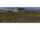Barn with horse stall and rolling field at 3487 Willownook Ranch Trl, Elizabeth, CO 80107