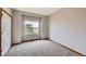 Neutral carpeted bedroom with a window providing exterior views and natural light at 3487 Willownook Ranch Trl, Elizabeth, CO 80107