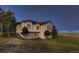 Exterior of home with lush lawn at 3487 Willownook Ranch Trl, Elizabeth, CO 80107