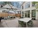 Spacious backyard with ample seating, a large umbrella, perfect for outdoor entertaining at 4508 Lowell Blvd, Denver, CO 80211