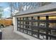 Garage with modern glass door and stylish design with potential office use at 4508 Lowell Blvd, Denver, CO 80211