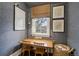Cozy home office with natural light, desk for two, and tasteful decor creating a productive space at 4508 Lowell Blvd, Denver, CO 80211
