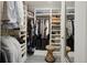 Well-organized walk-in closet with custom shelving and ample space for clothes, shoes and accessories at 4508 Lowell Blvd, Denver, CO 80211