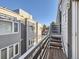 Private balcony with stairs and building views at 1537 W 43Rd Ave, Denver, CO 80211