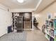 Finished basement with wine cooler, storage, and exercise area at 1537 W 43Rd Ave, Denver, CO 80211