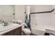 Clean bathroom with bathtub, shower, and white tile at 1537 W 43Rd Ave, Denver, CO 80211