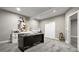 Bright home office featuring a large desk and ample storage space at 23696 E Del Norte Pl, Aurora, CO 80016