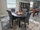 Basement recreation room with a foosball table, shelving and a round table with chairs at 23696 E Del Norte Pl, Aurora, CO 80016