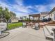Seating area next to backyard deck with outdoor BBQ, patio seating and lush yard, perfect for entertaining at 11395 E 116Th Dr, Commerce City, CO 80640