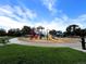 Community playground featuring colorful slides and climbing structures, perfect for Gathering fun and recreation at 11395 E 116Th Dr, Commerce City, CO 80640