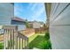 Cozy backyard featuring green turf and a wood fence at 3810 Cadence Dr, Castle Rock, CO 80109