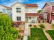 Charming two-story home with landscaped yard, inviting front porch, and beautiful exterior details at 3810 Cadence Dr, Castle Rock, CO 80109