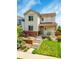 Charming two-story home with landscaped front yard and inviting porch at 3810 Cadence Dr, Castle Rock, CO 80109