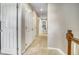 Upstairs hallway with carpet and white doors to other rooms at 3810 Cadence Dr, Castle Rock, CO 80109