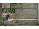 Aerial view of property showcasing the expansive land, farmhouse, and serene setting at 35427 Welch Trl, Elizabeth, CO 80107