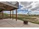 Backyard with a fire pit, lush green grass, and playset offers outdoor enjoyment at 35427 Welch Trl, Elizabeth, CO 80107