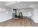 Finished basement with a wood-burning stove, play area, and neutral walls at 35427 Welch Trl, Elizabeth, CO 80107