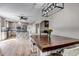 Open floor plan from dining room showcasing kitchen with island at 35427 Welch Trl, Elizabeth, CO 80107