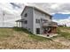 Two-story home with a walkout basement, back deck, and a spacious backyard at 35427 Welch Trl, Elizabeth, CO 80107