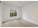 Bedroom with carpeted floors and large window at 912 S Yampa St # 203, Aurora, CO 80017