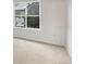 A room with carpet, a window, and neutral paint at 912 S Yampa St # 203, Aurora, CO 80017
