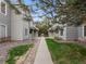 Exterior view of apartment buildings and a sidewalk at 912 S Yampa St # 203, Aurora, CO 80017